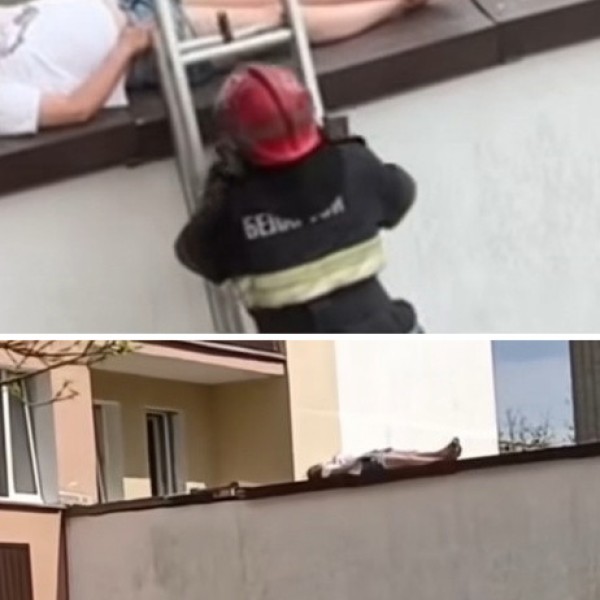 В Беларуси женщина загорала на самом краю крыши — видео