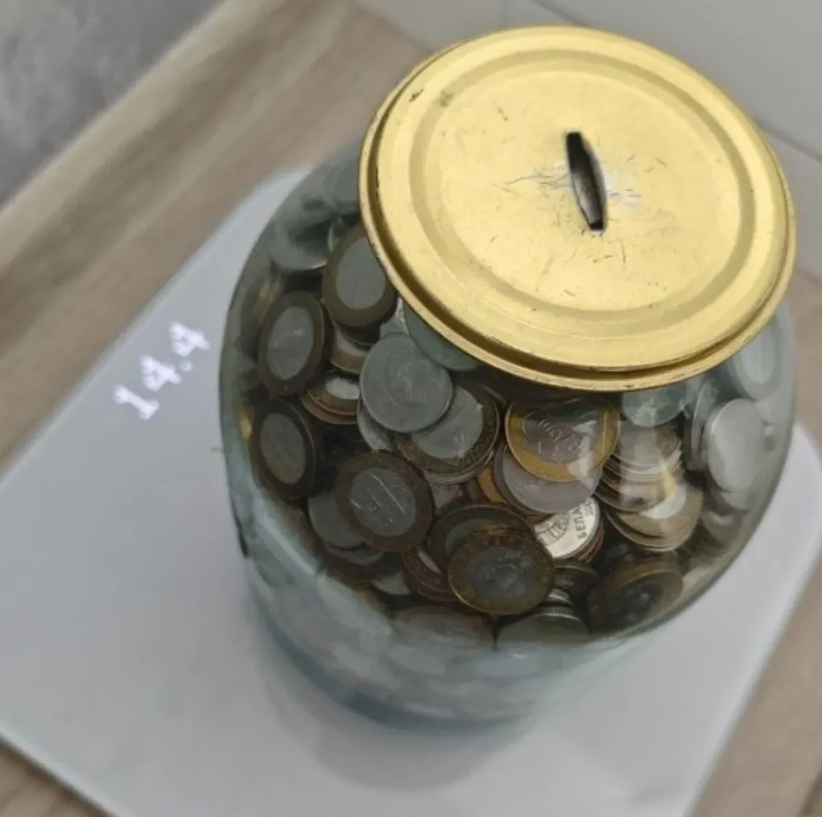 Семья почти 3 года копила монеты в банке — вот какая сумма вышла